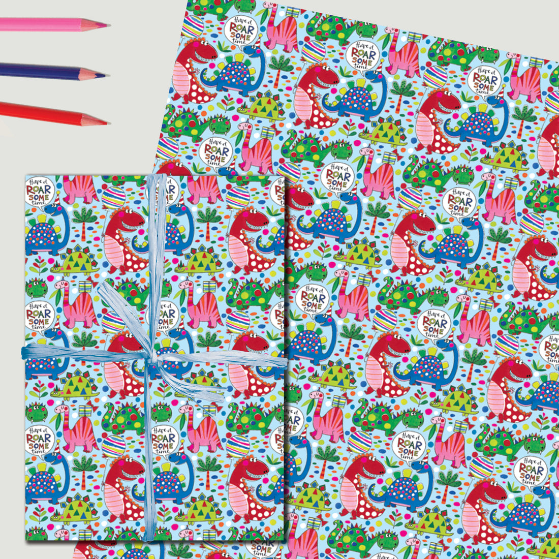Gift Wrap Sheet - Dinosaurs on pale blue