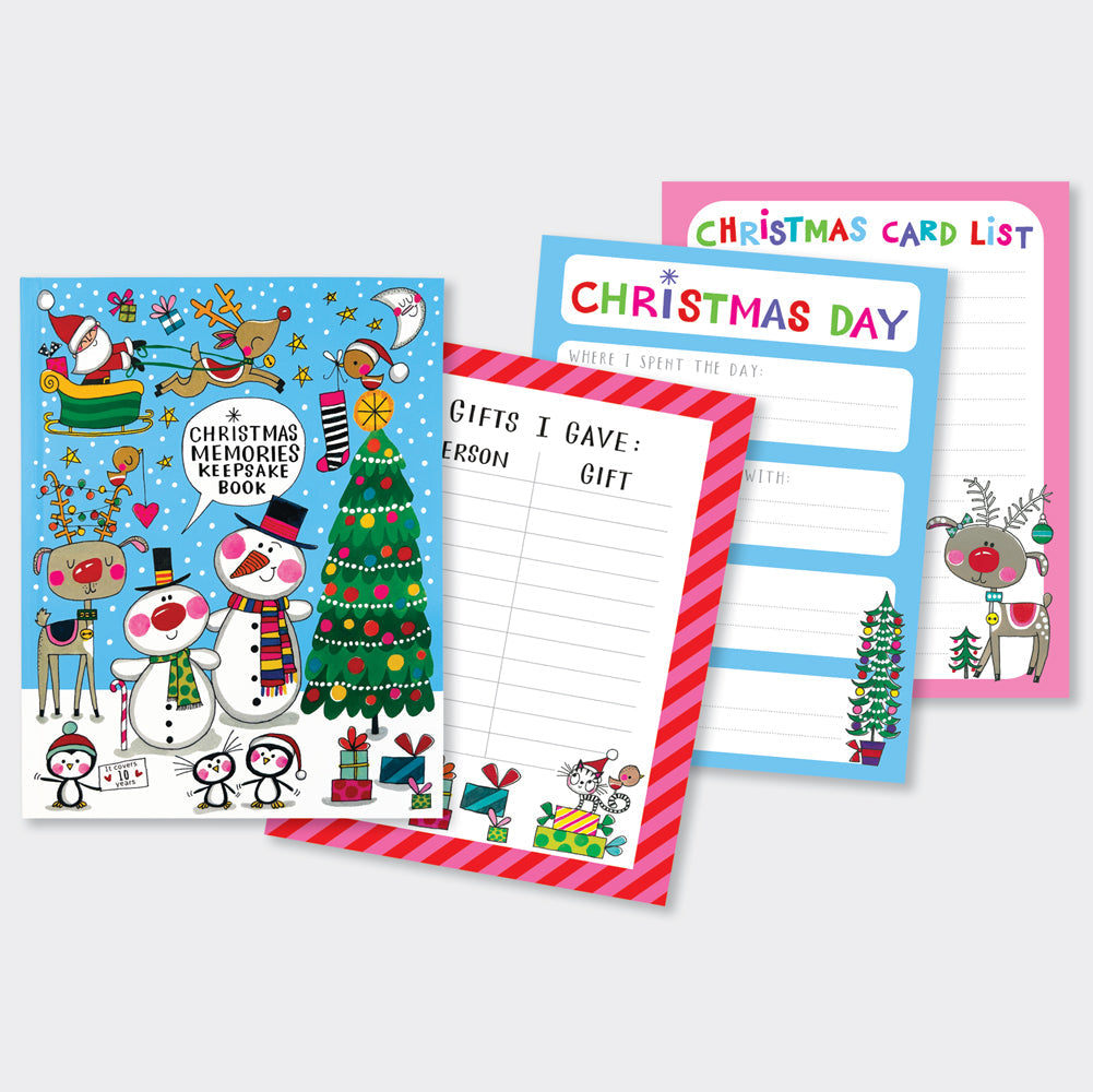 Close up of the open Christmas Keepsake Journal showing colourful, illustrated pages and a writing prompt section for recording 10 years of family memories.