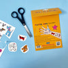 Playful Pups tattoos with packaging, scissors, and instructions on a blue background